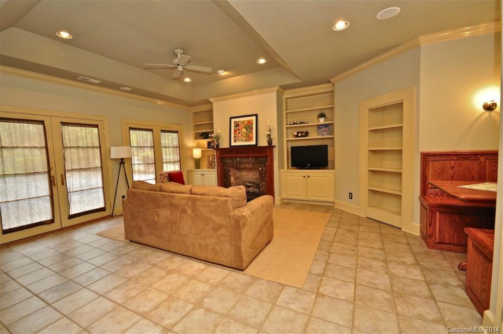 1931 Providence Road Charlotte, NC 28211 - Photo 19 of 22 a living room with furniture and a flat screen tv