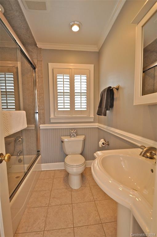 1931 Providence Road Charlotte, NC 28211 - Photo 20 of 22 a bathroom with a bathtub sink and toilet