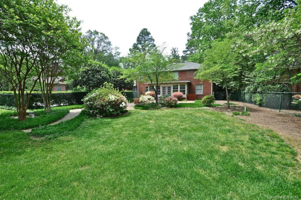 1931 Providence Road Charlotte, NC 28211 - Photo 22 of 22 a view of a house with a big yard and large trees