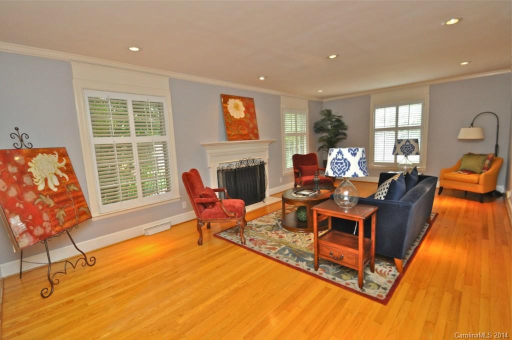 1931 Providence Road Charlotte, NC 28211 - Photo 4 of 22 a living room with furniture and a fireplace