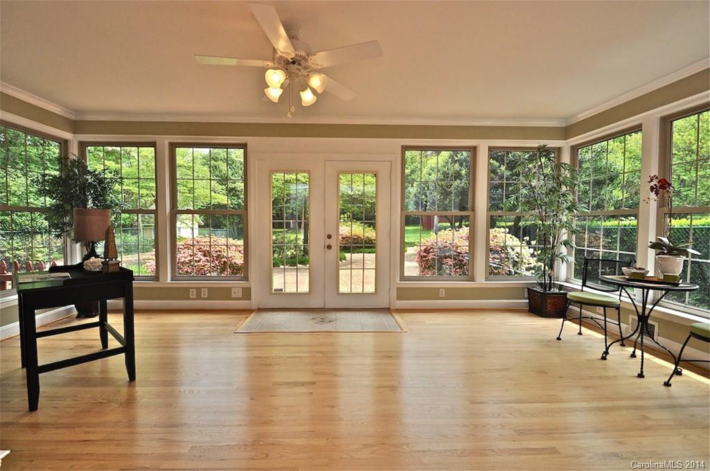 1931 Providence Road Charlotte, NC 28211 - Photo 7 of 22 a living room with furniture and a large window