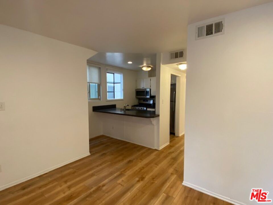 1908 Pacific Avenue Venice, CA 90291 - Photo 6 of 16 a view of kitchen and wooden floor