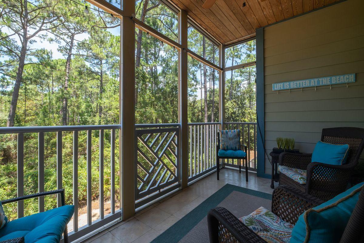 231 Somerset Bridge Road, Unit 2205 Santa Rosa Beach, FL 32459 - Photo 17 of 40 a view of a porch with furniture