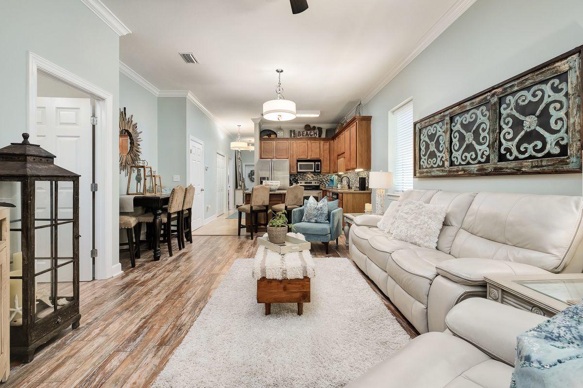231 Somerset Bridge Road, Unit 2205 Santa Rosa Beach, FL 32459 - Photo 2 of 40 a living room with furniture and wooden floor