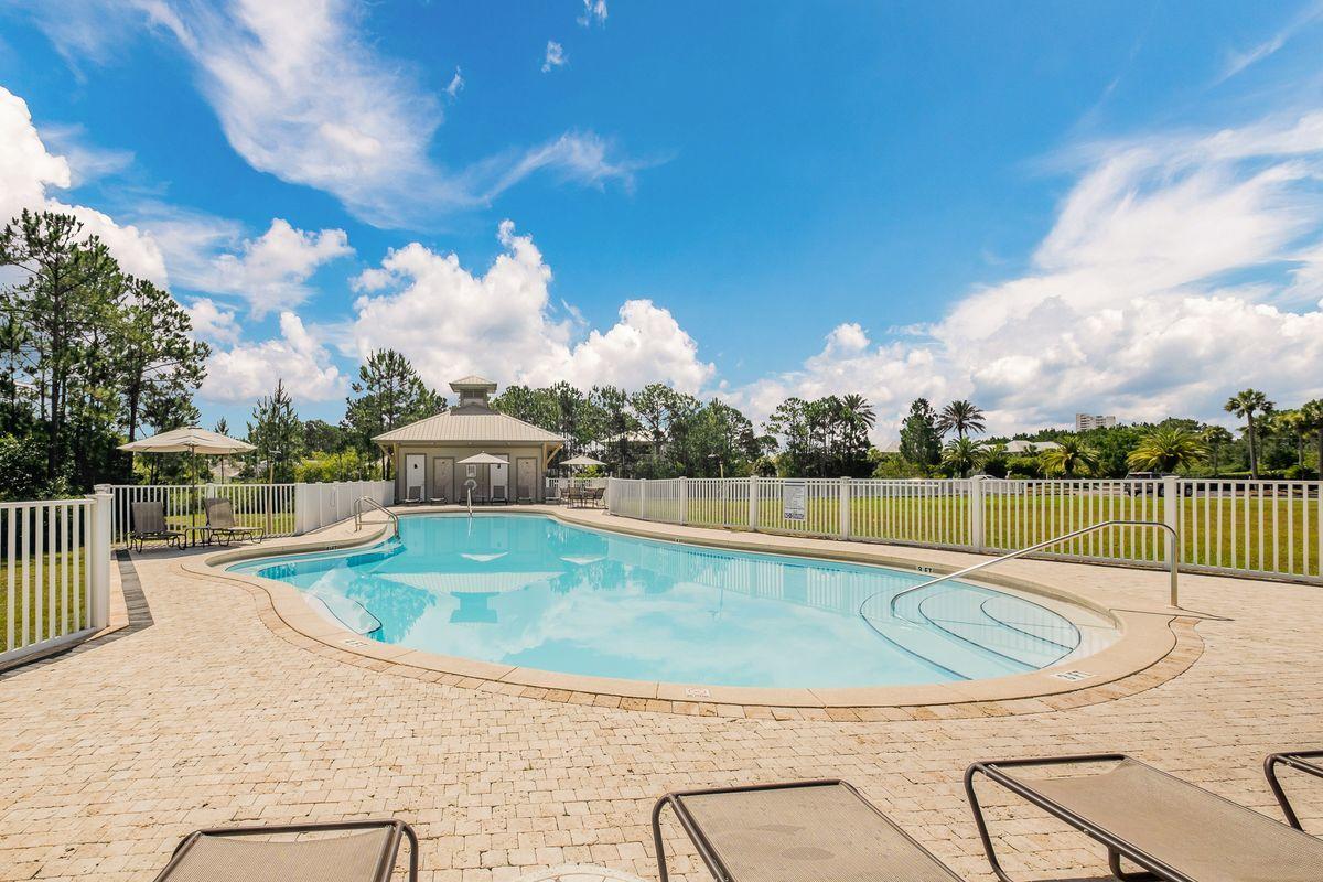 231 Somerset Bridge Road, Unit 2205 Santa Rosa Beach, FL 32459 - Photo 24 of 40 a view of a swimming pool with a patio
