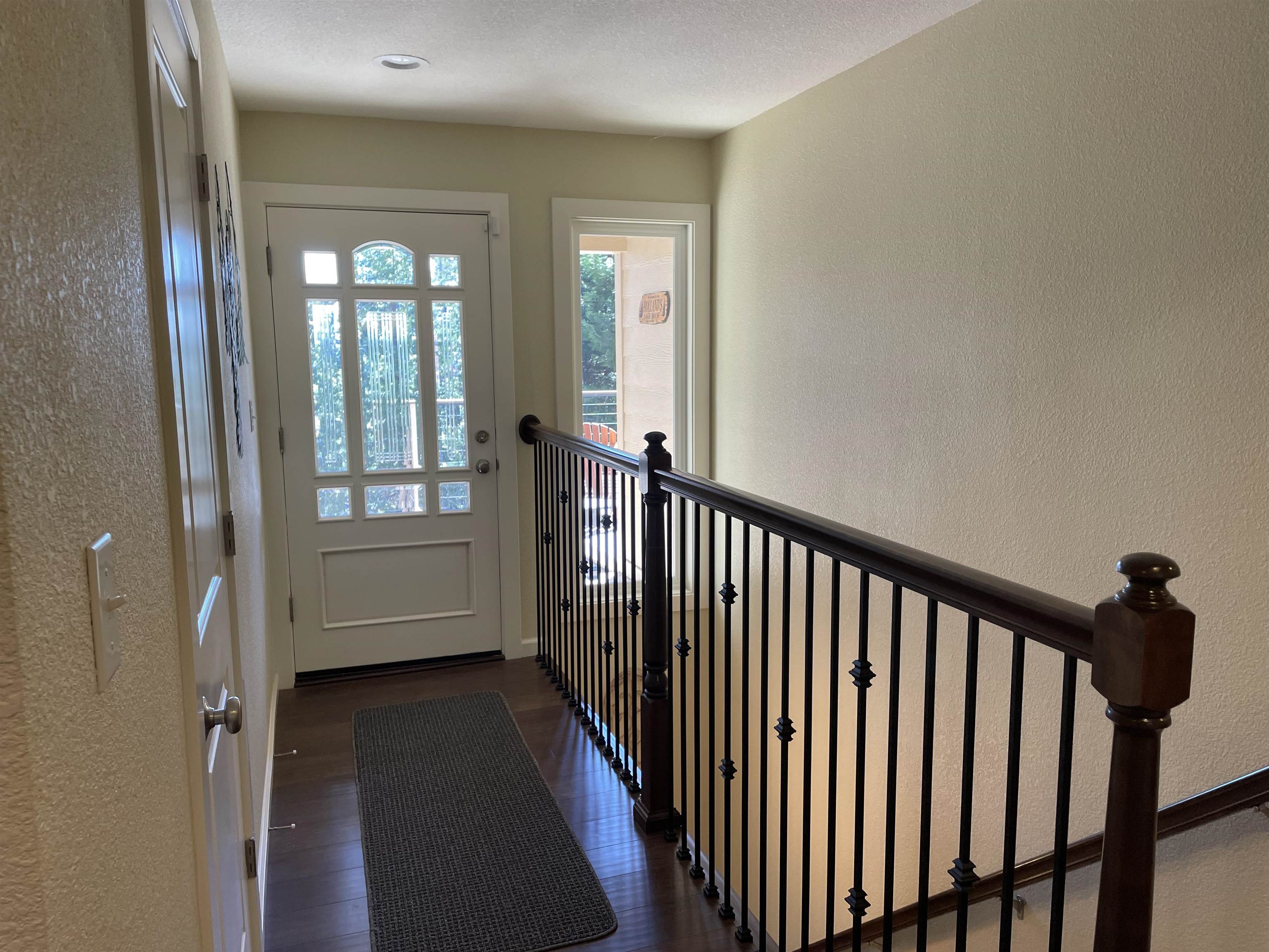 831 Timber Ridge Road Lake Almanor, CA 96137 - Photo 4 of 36 a view of a hallway with a livingroom