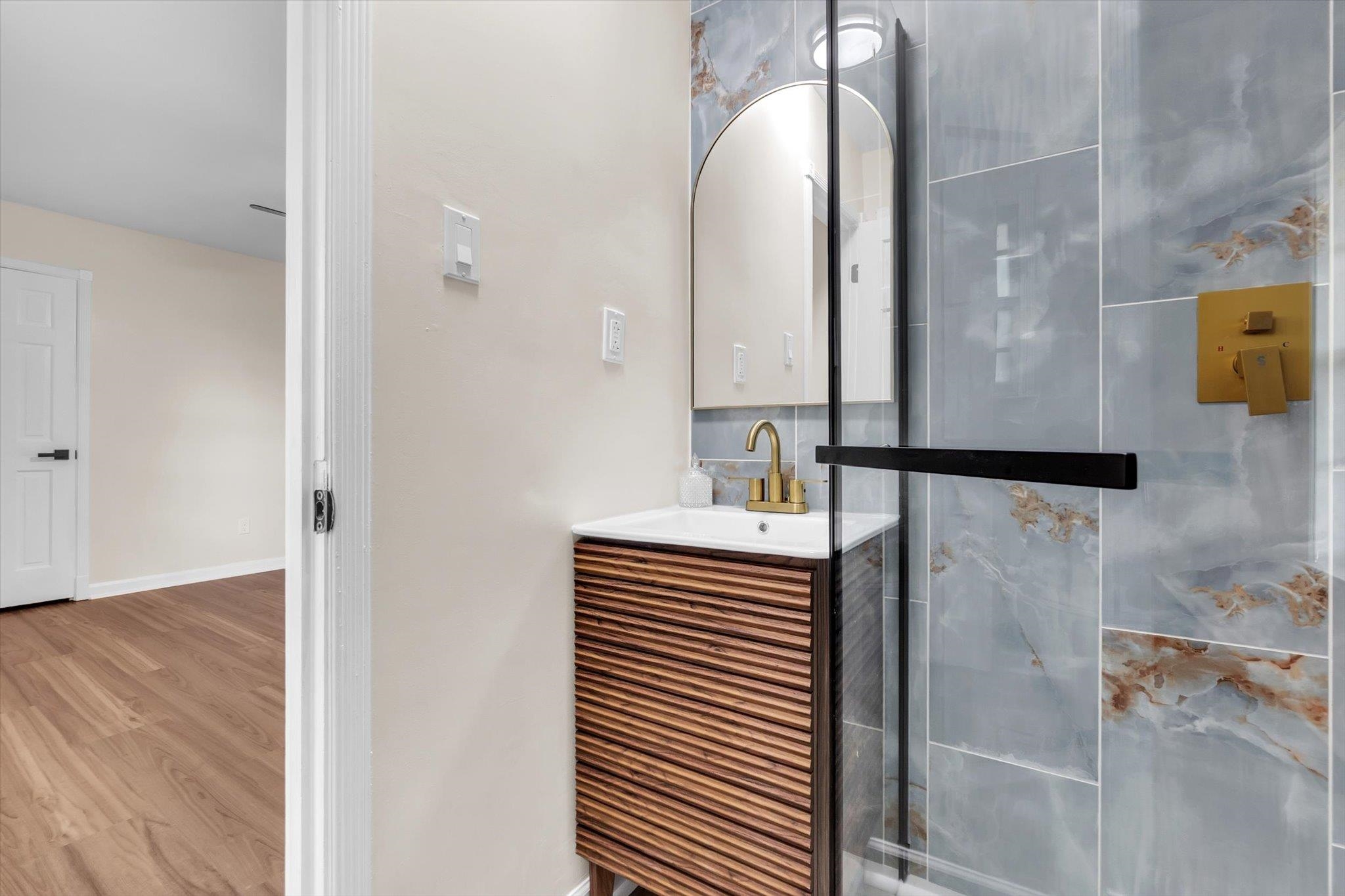 5509 Rappahannock Drive Memphis, TN 38134 - Photo 22 of 27 Bathroom featuring vanity and light wood finished floors