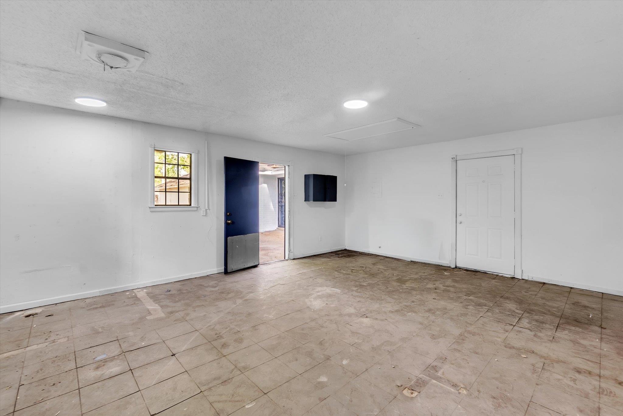5509 Rappahannock Drive Memphis, TN 38134 - Photo 24 of 27 Unfurnished room with attic access and a textured ceiling