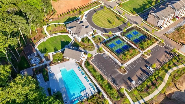 a front view of a house with swimming pool