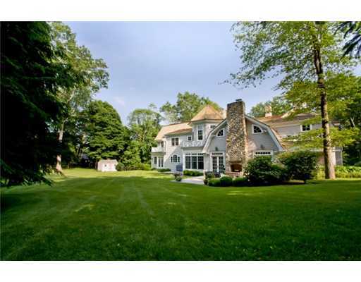 79 Stephen Mather Road Darien, CT 06820 - Photo 18 of 20 a front view of a house with a garden
