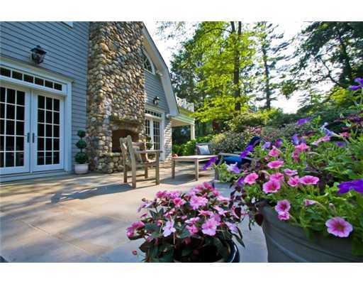 79 Stephen Mather Road Darien, CT 06820 - Photo 4 of 20 a view of lot of flowers and a house