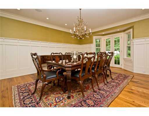 79 Stephen Mather Road Darien, CT 06820 - Photo 8 of 20 a view of a dining room with furniture and chandelier