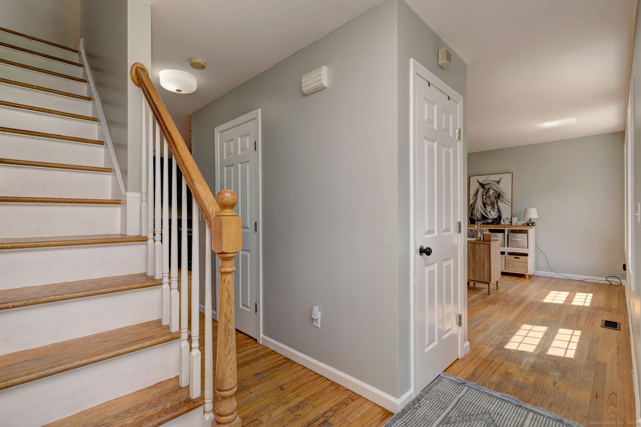 28 Edgewood Avenue Shelton, CT 06484 - Photo 11 of 40 a view of entryway with wooden floor and livingroom view