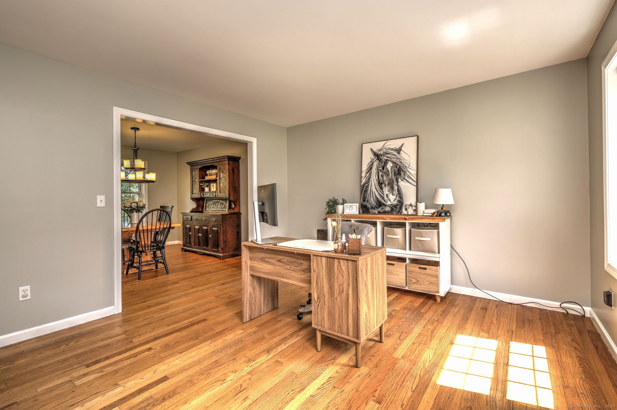 28 Edgewood Avenue Shelton, CT 06484 - Photo 12 of 40 a living room with furniture a dining table and kitchen view