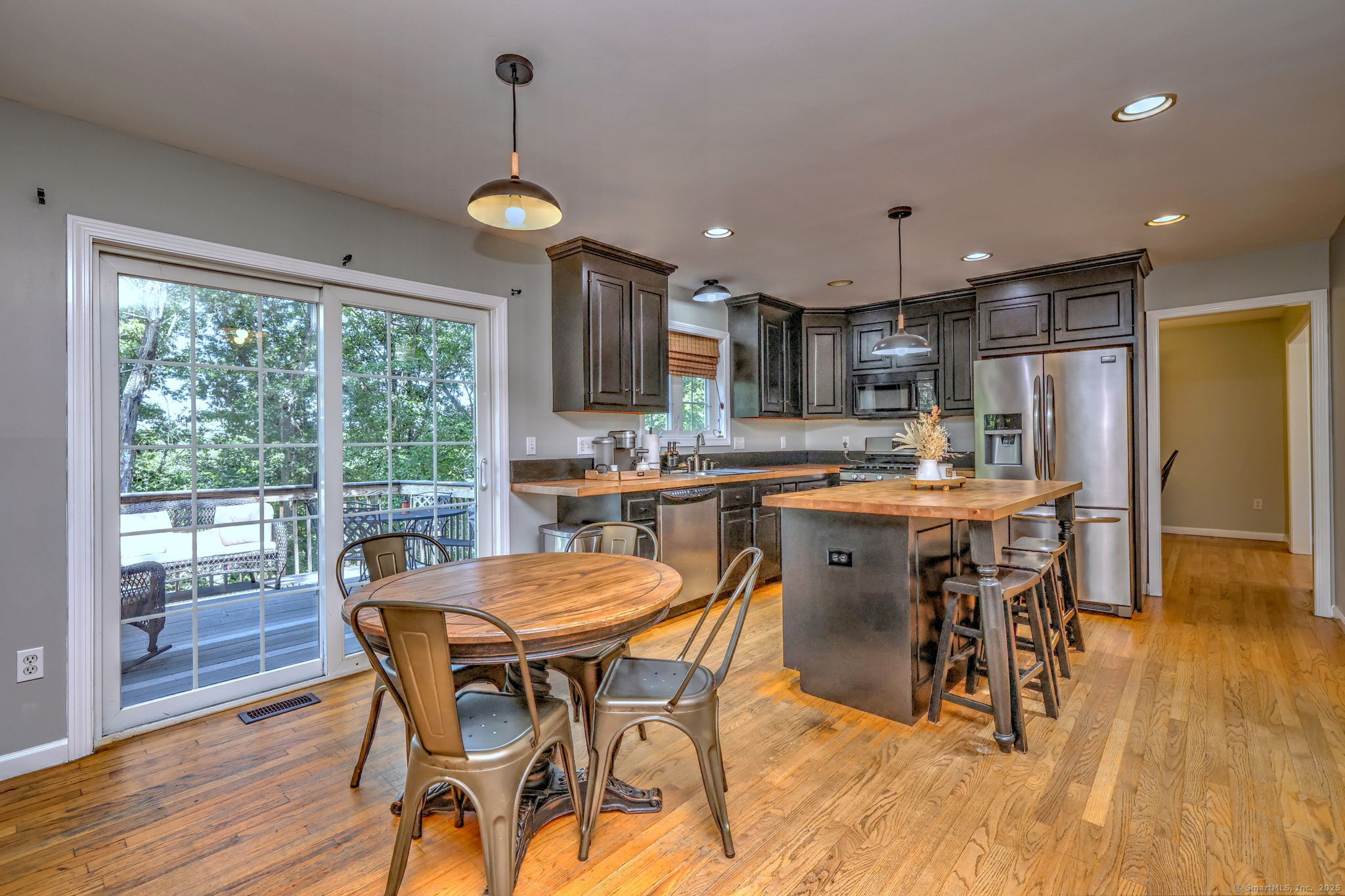 28 Edgewood Avenue Shelton, CT 06484 - Photo 14 of 40 a view of a dining room with furniture window and wooden floor