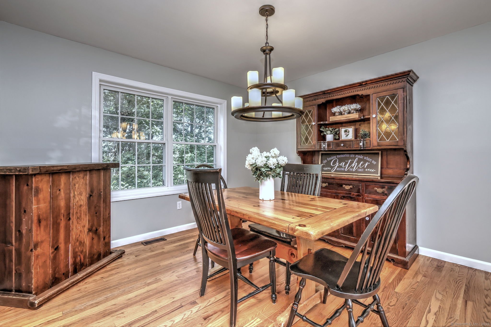 28 Edgewood Avenue Shelton, CT 06484 - Photo 20 of 40 a view of a dining room with furniture window and wooden floor