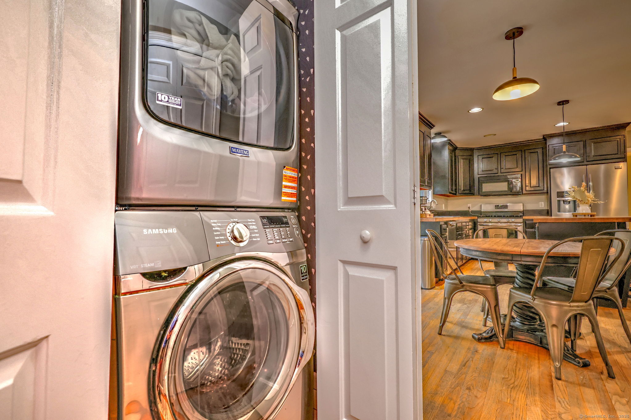 28 Edgewood Avenue Shelton, CT 06484 - Photo 22 of 40 a view of a kitchen with stainless steel appliances granite countertop cabinets and a stove top oven