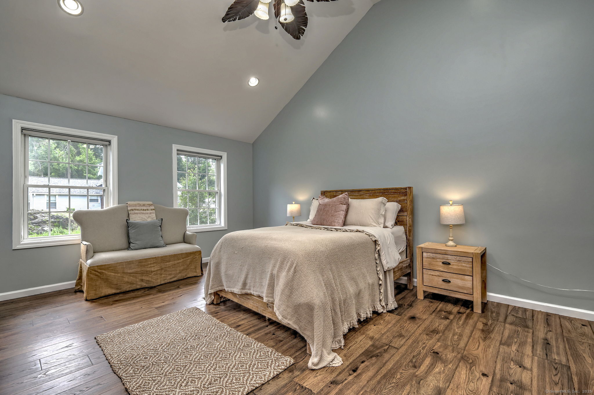 28 Edgewood Avenue Shelton, CT 06484 - Photo 24 of 40 a bedroom with a bed and wooden floor