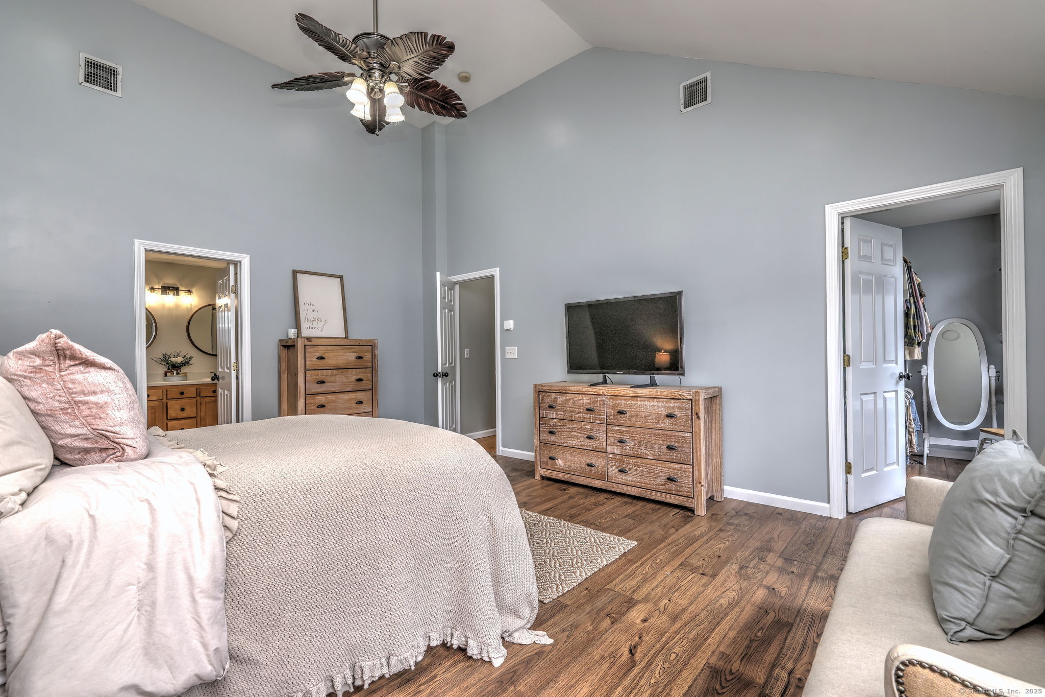 28 Edgewood Avenue Shelton, CT 06484 - Photo 25 of 40 a bedroom with furniture and a flat screen tv