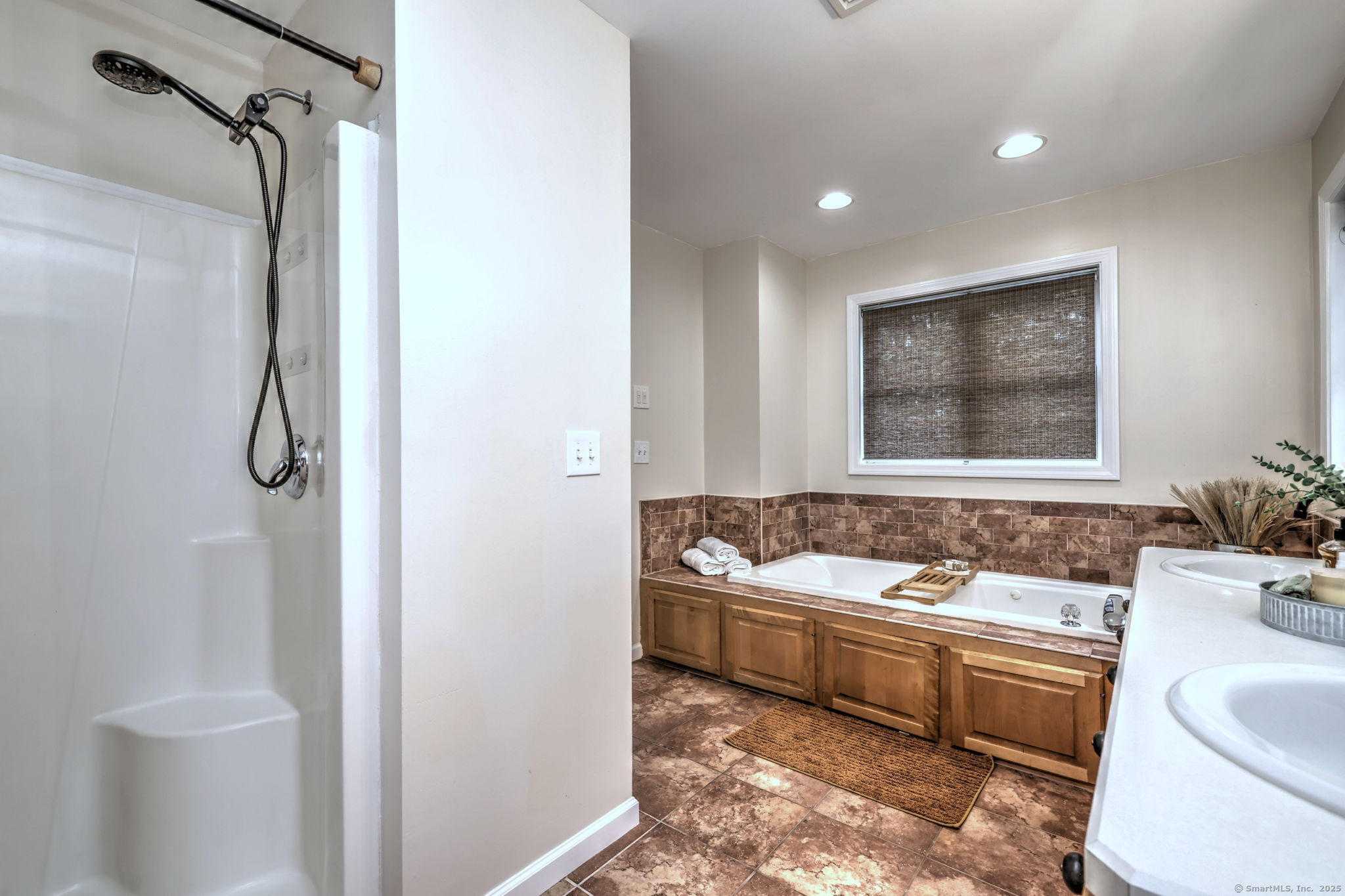 28 Edgewood Avenue Shelton, CT 06484 - Photo 27 of 40 a bathroom with a sink a toilet and bathtub