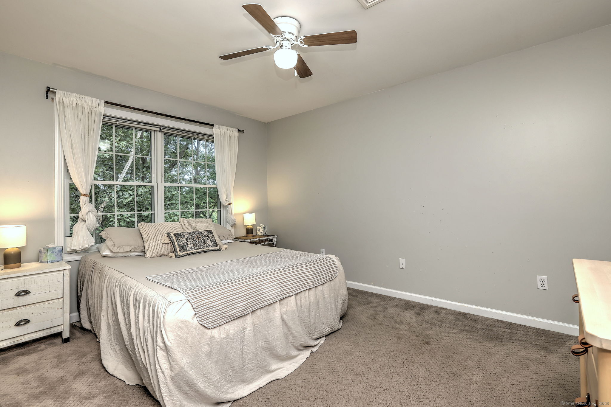 28 Edgewood Avenue Shelton, CT 06484 - Photo 32 of 40 a bedroom with a bed and a window