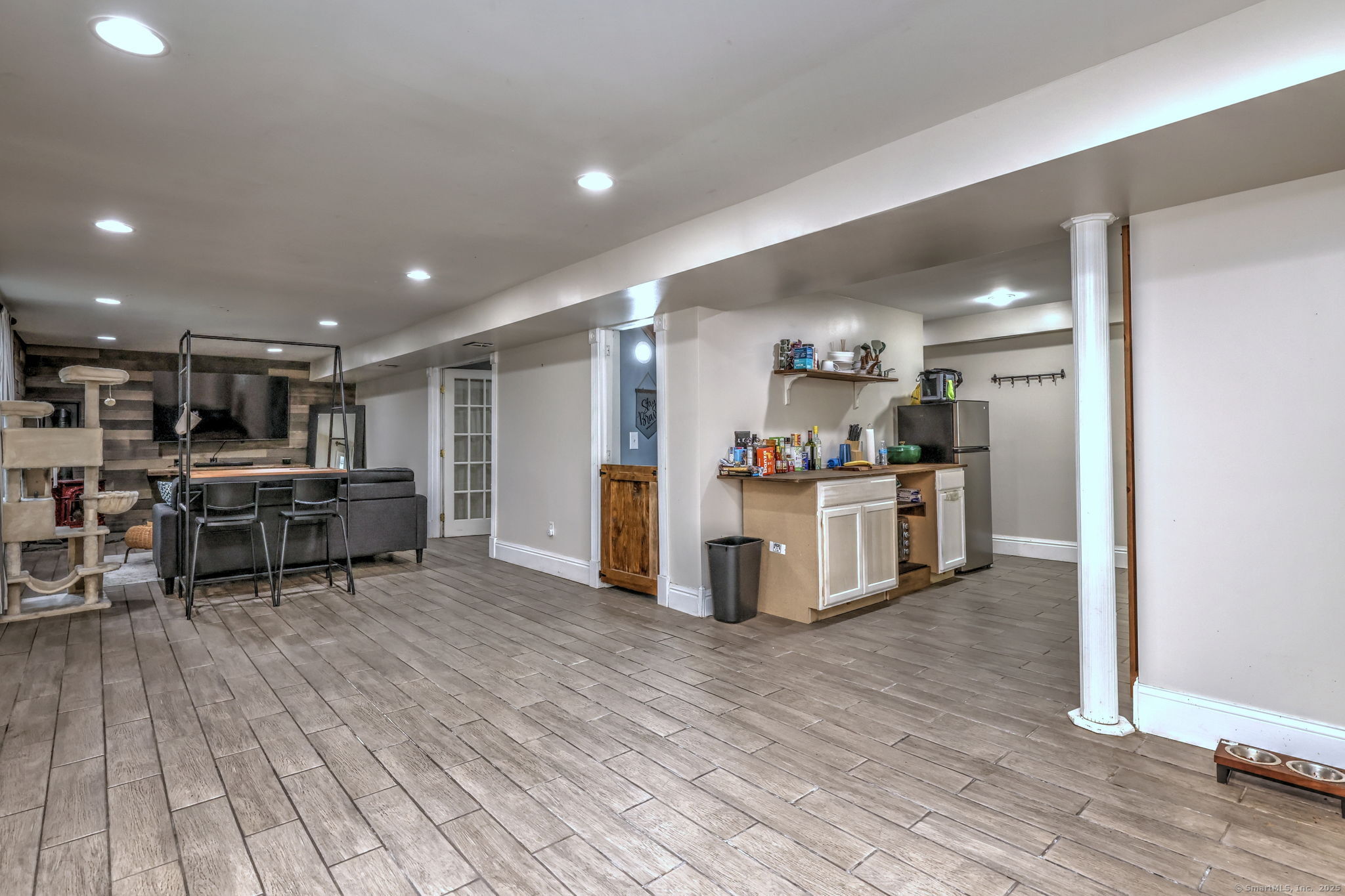 28 Edgewood Avenue Shelton, CT 06484 - Photo 33 of 40 a kitchen with stainless steel appliances kitchen island wooden cabinets and granite counter tops
