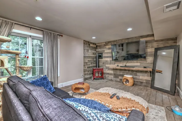 a bed room with a bed and glass door