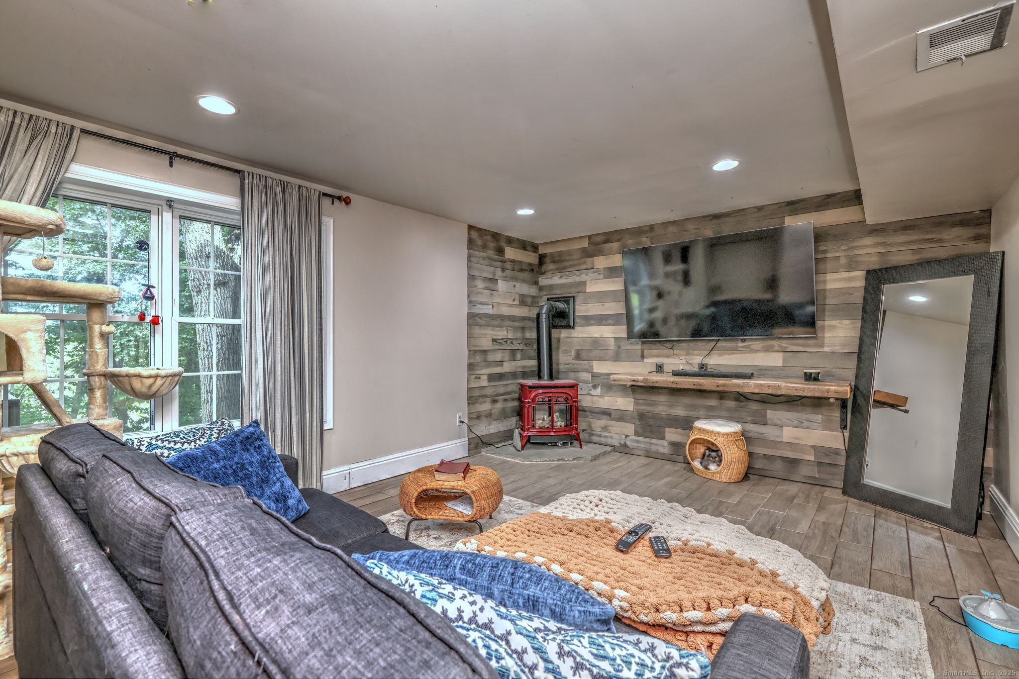 28 Edgewood Avenue Shelton, CT 06484 - Photo 34 of 40 a bed room with a bed and glass door