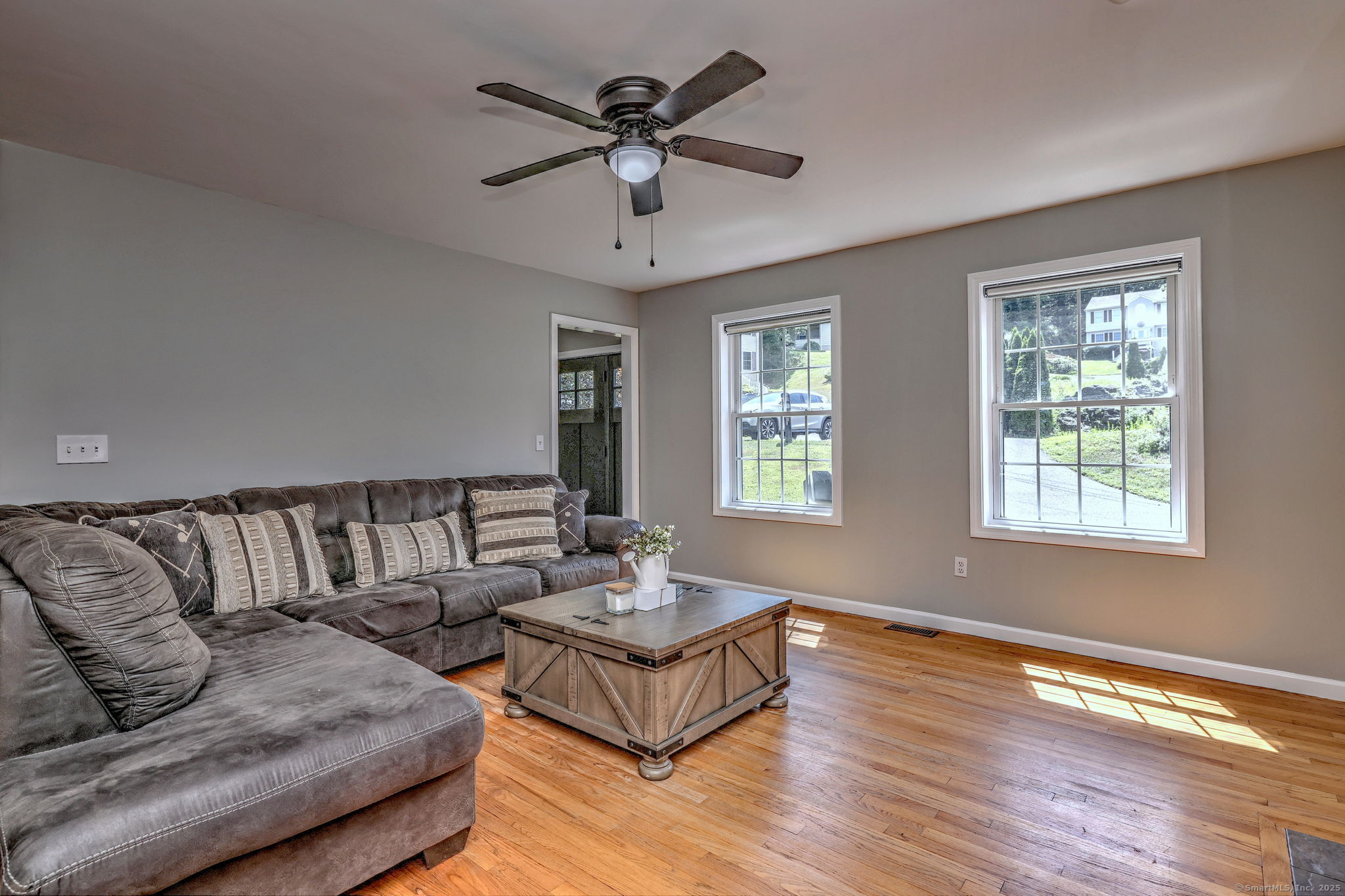 28 Edgewood Avenue Shelton, CT 06484 - Photo 9 of 40 a living room with furniture and a large window