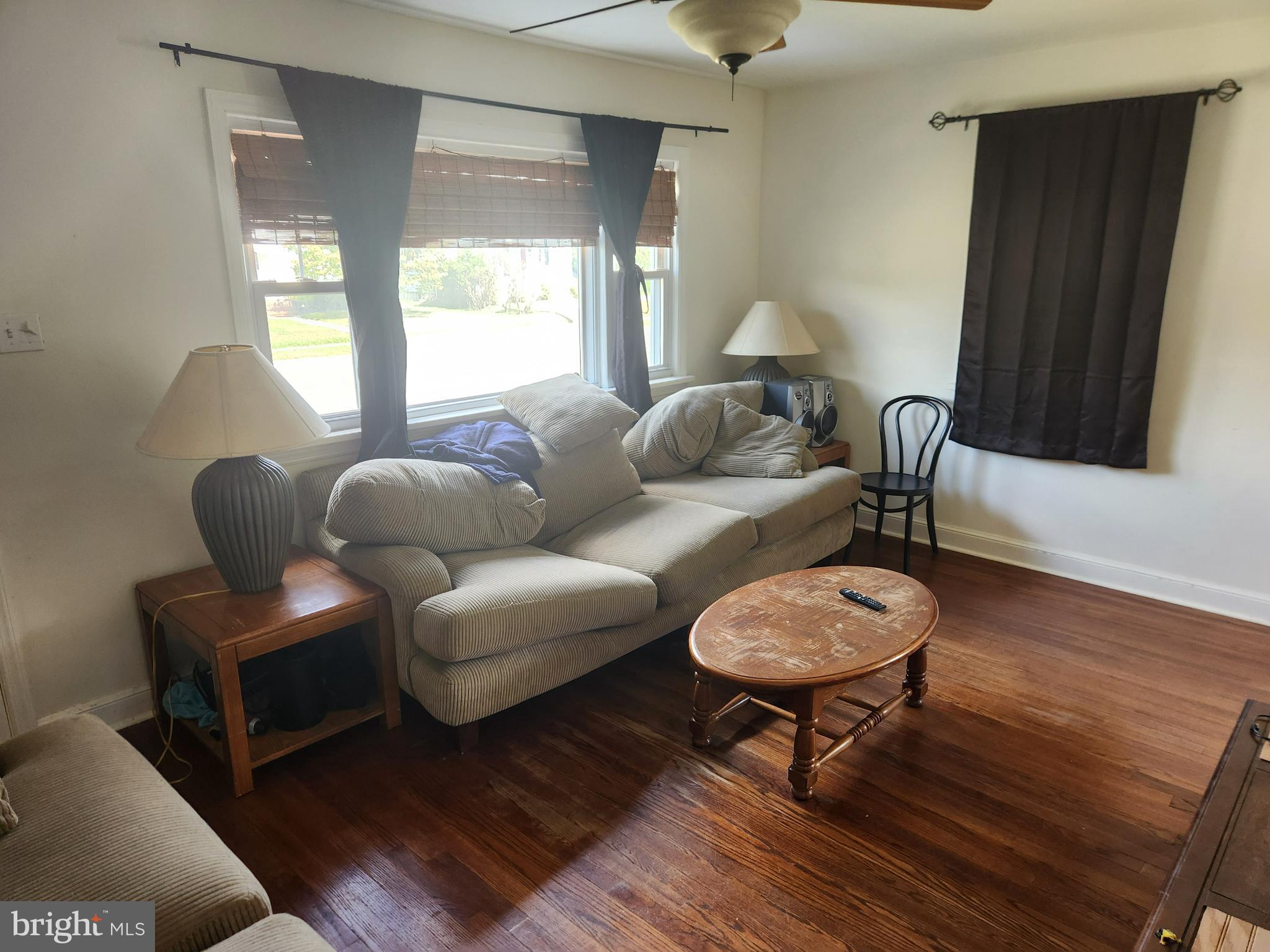 122 Cornell Road Glassboro, NJ 08028 - Photo 7 of 13 a living room with furniture and a wooden floor