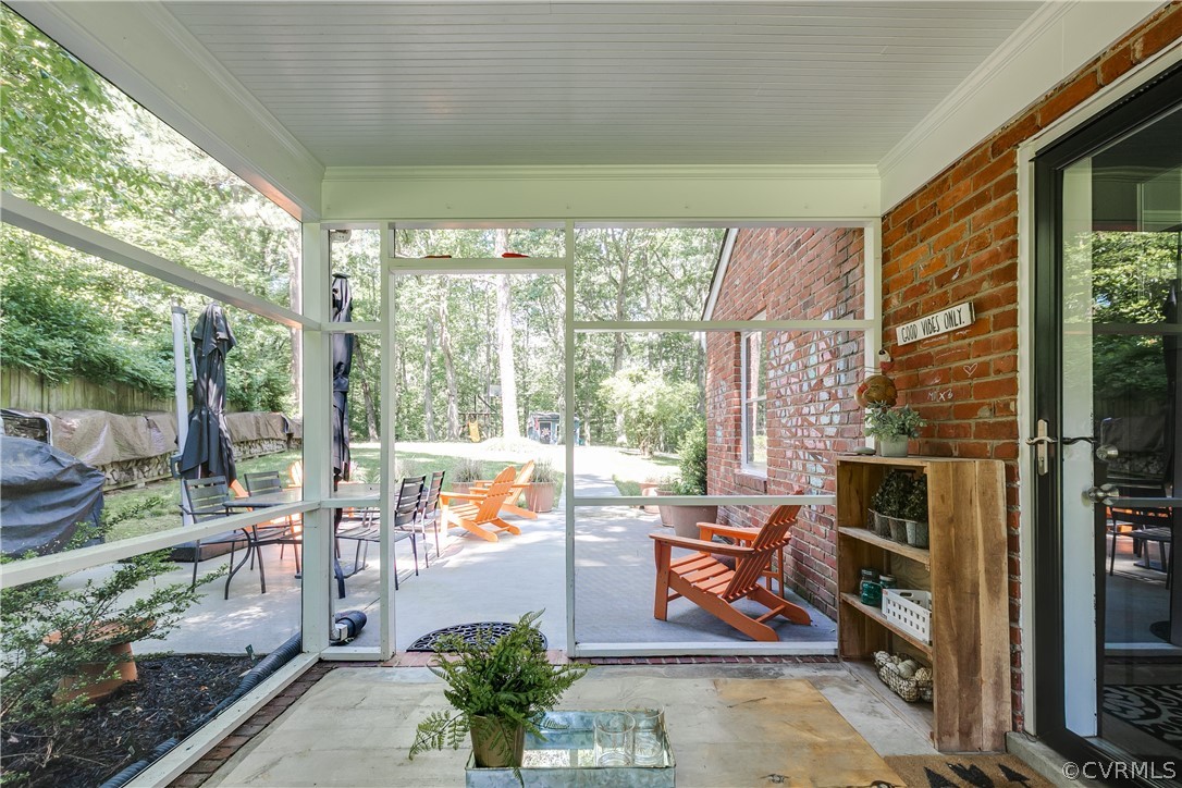 3744 Cheverly Road Richmond, VA 23225 - Photo 25 of 31 Screened-in porch leading to patio