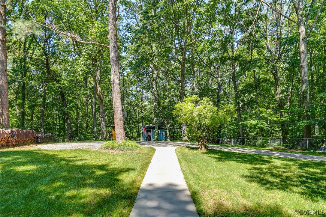 3744 Cheverly Road Richmond, VA 23225 - Photo 28 of 31 HUGE 3/4 acre lot with sidewalk to shed and parkin