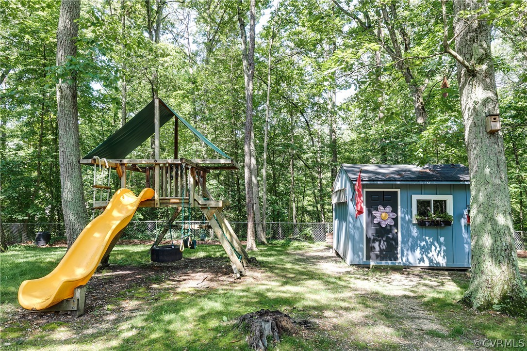 3744 Cheverly Road Richmond, VA 23225 - Photo 29 of 31 Play set and shed