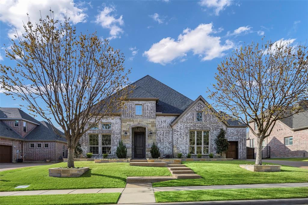 1220 Packsaddle Trail Prosper, TX 75078 - Photo 1 of 33 a front view of a building with trees