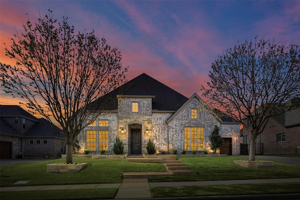 1220 Packsaddle Trail Prosper, TX 75078 - Photo 2 of 33 a front view of a house with a yard
