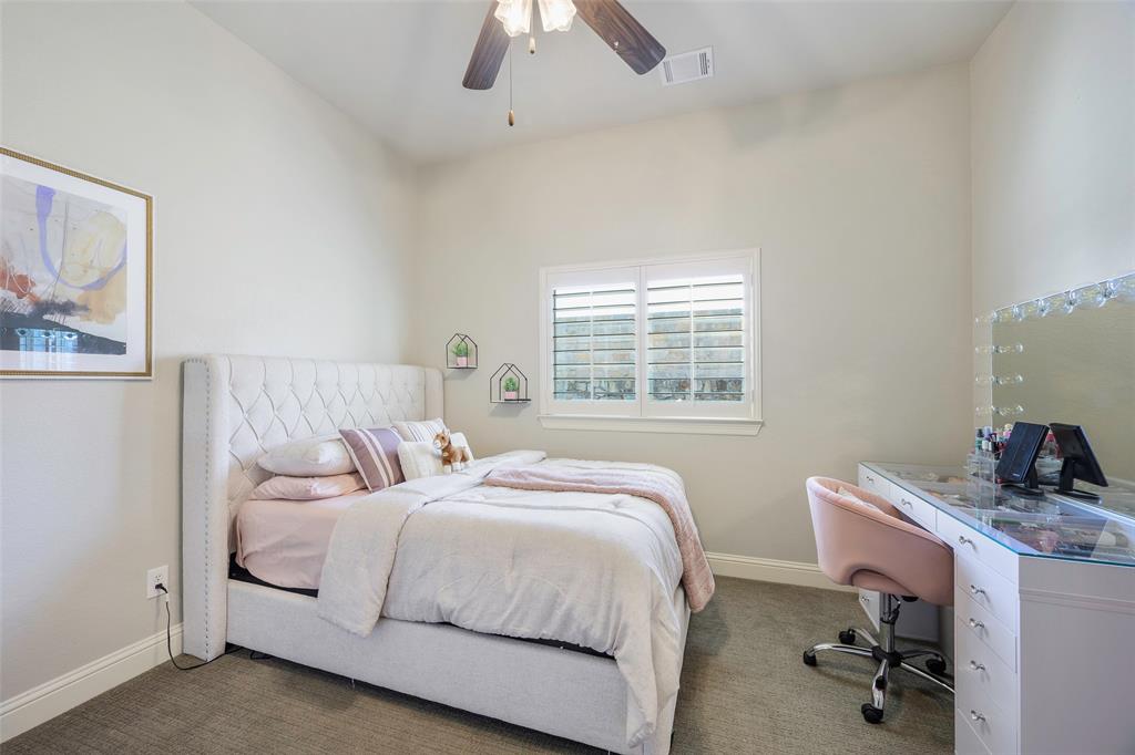 1220 Packsaddle Trail Prosper, TX 75078 - Photo 22 of 33 a bedroom with a bed and a window