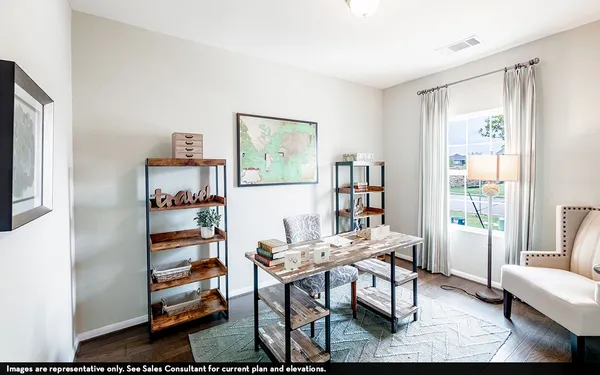 a workspace with furniture and window