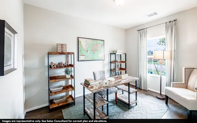 a workspace with furniture and window