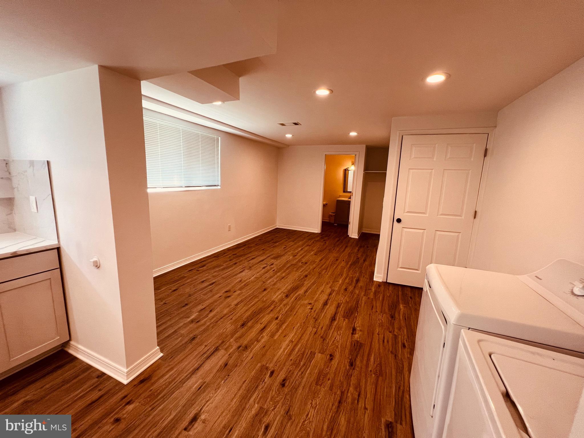 11814 Mentone Road Silver Spring, MD 20906 - Photo 5 of 12 a view of a livingroom with wooden floor