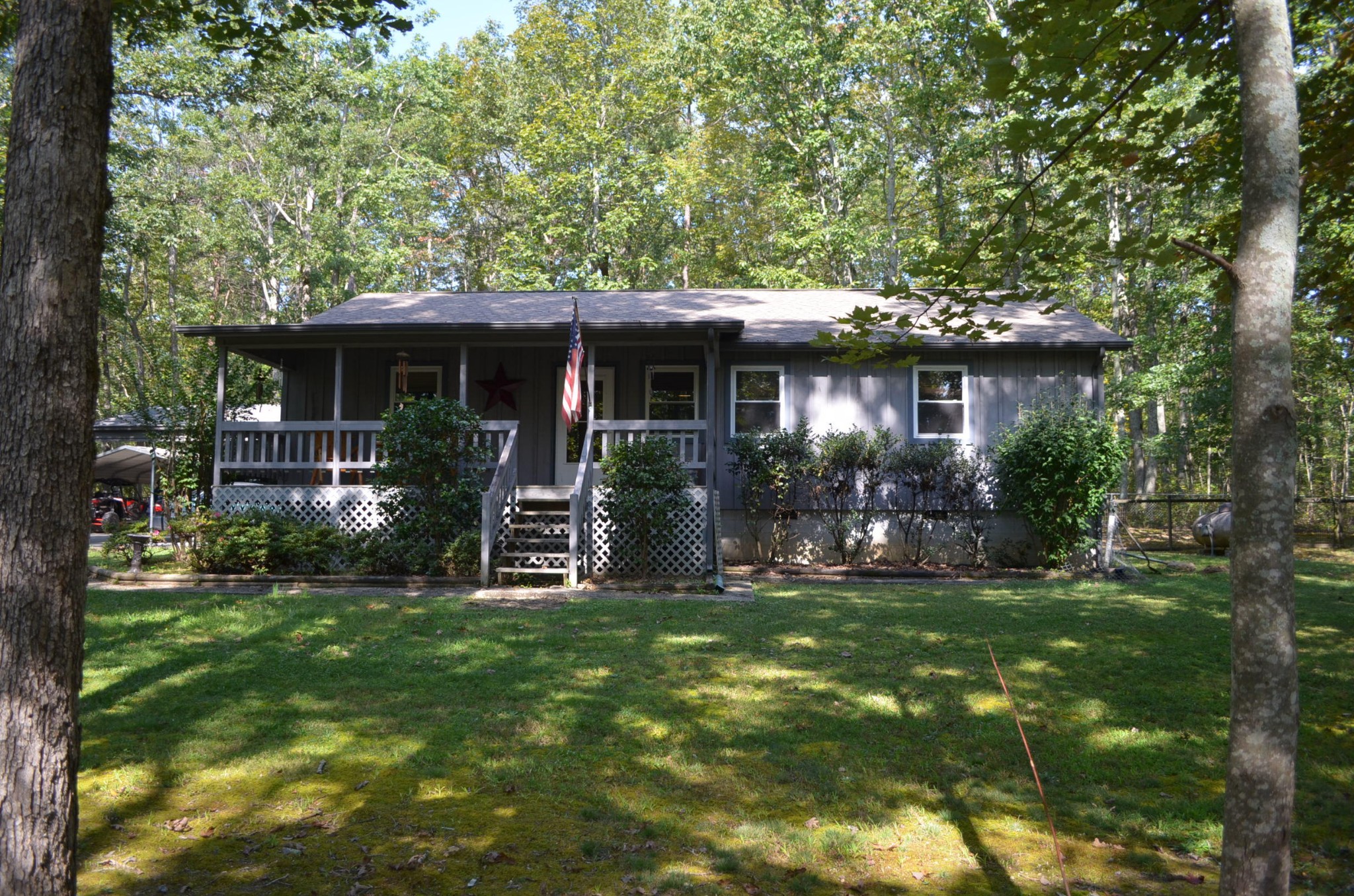 175 Memory Lane Grandview, TN 37337 - Photo 1 of 23 a view of a house with a yard potted plants and large tree