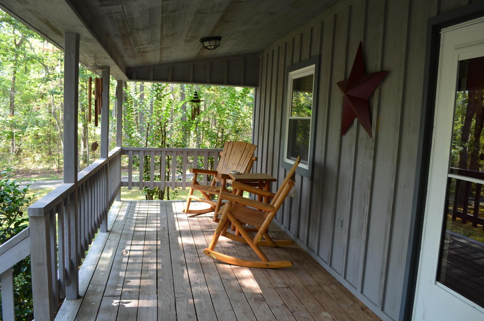175 Memory Lane Grandview, TN 37337 - Photo 5 of 23 a view of a balcony with chairs and wooden floor