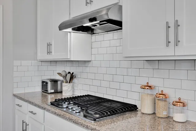 a bed room with a bed and a large window