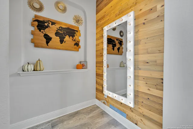 a large white kitchen with a large tub and sink