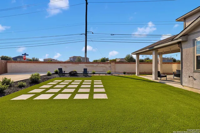 an aerial view of a building with outdoor space