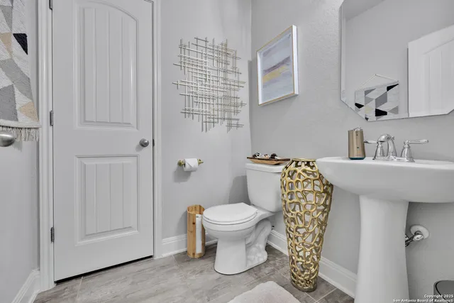 a view of a dining room with furniture and window
