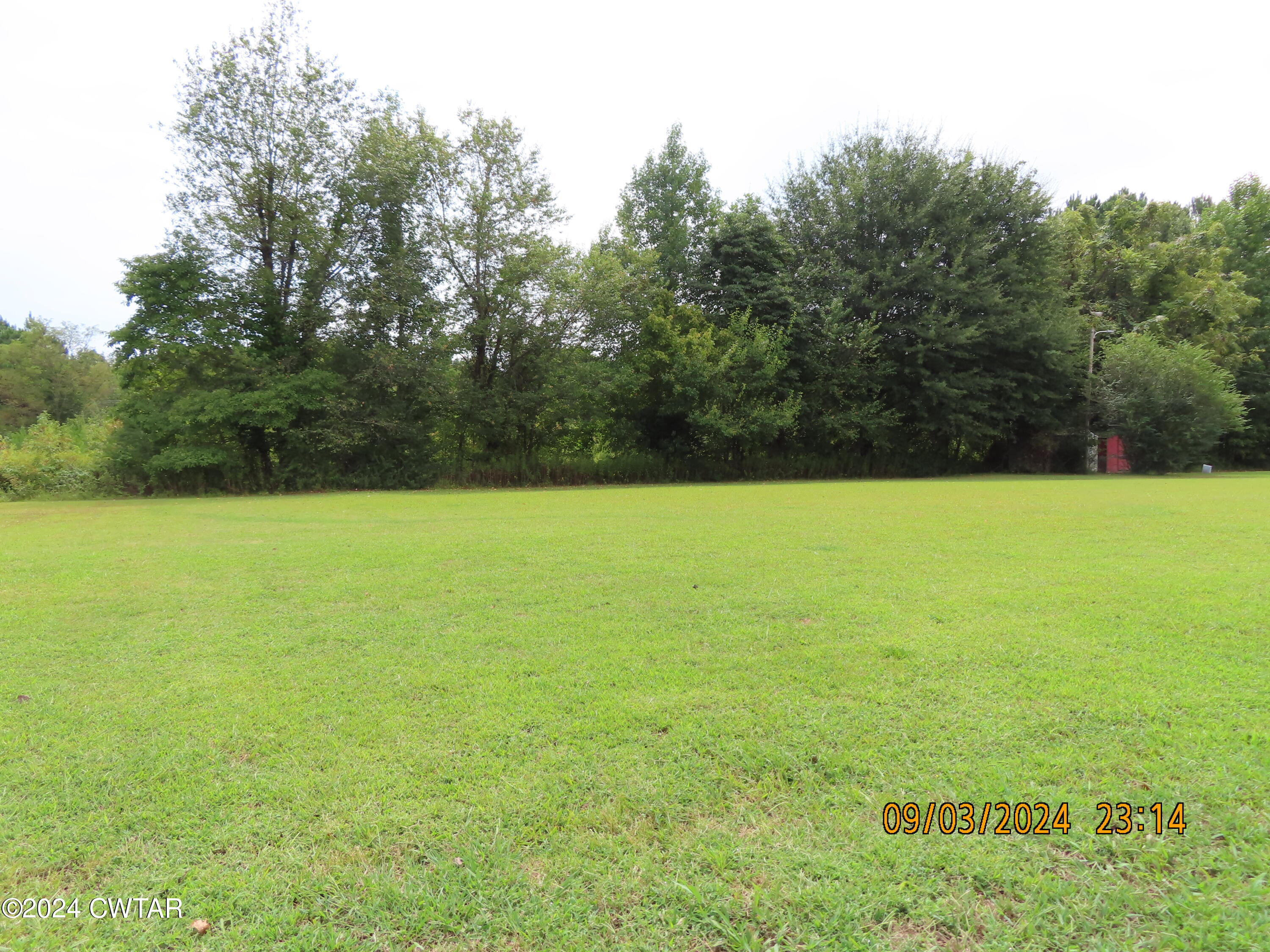 254 Rhea Street Jackson, TN 38301 - Photo 20 of 21 a view of a large pool with a yard