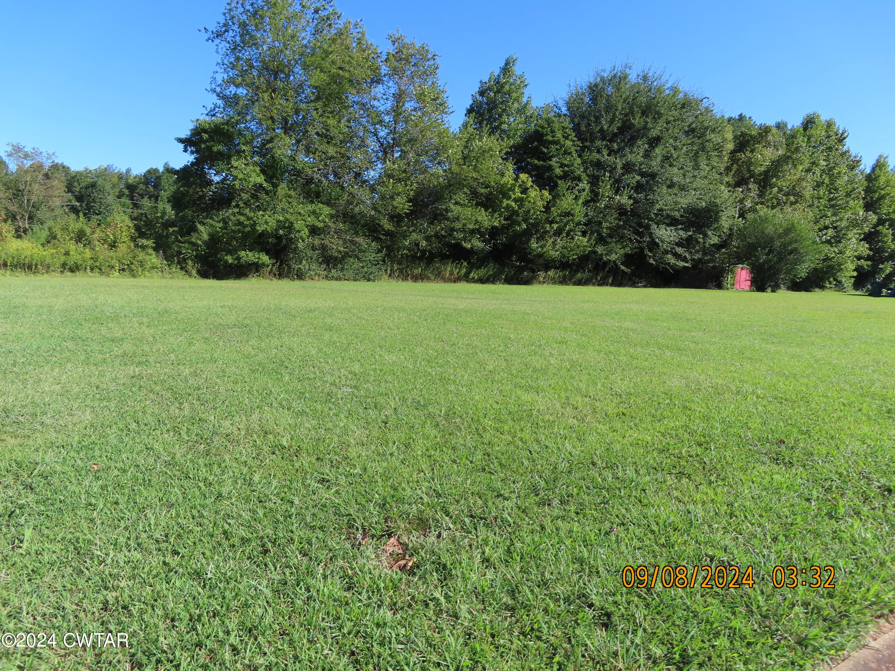 254 Rhea Street Jackson, TN 38301 - Photo 6 of 21 a view of a field of grass and trees