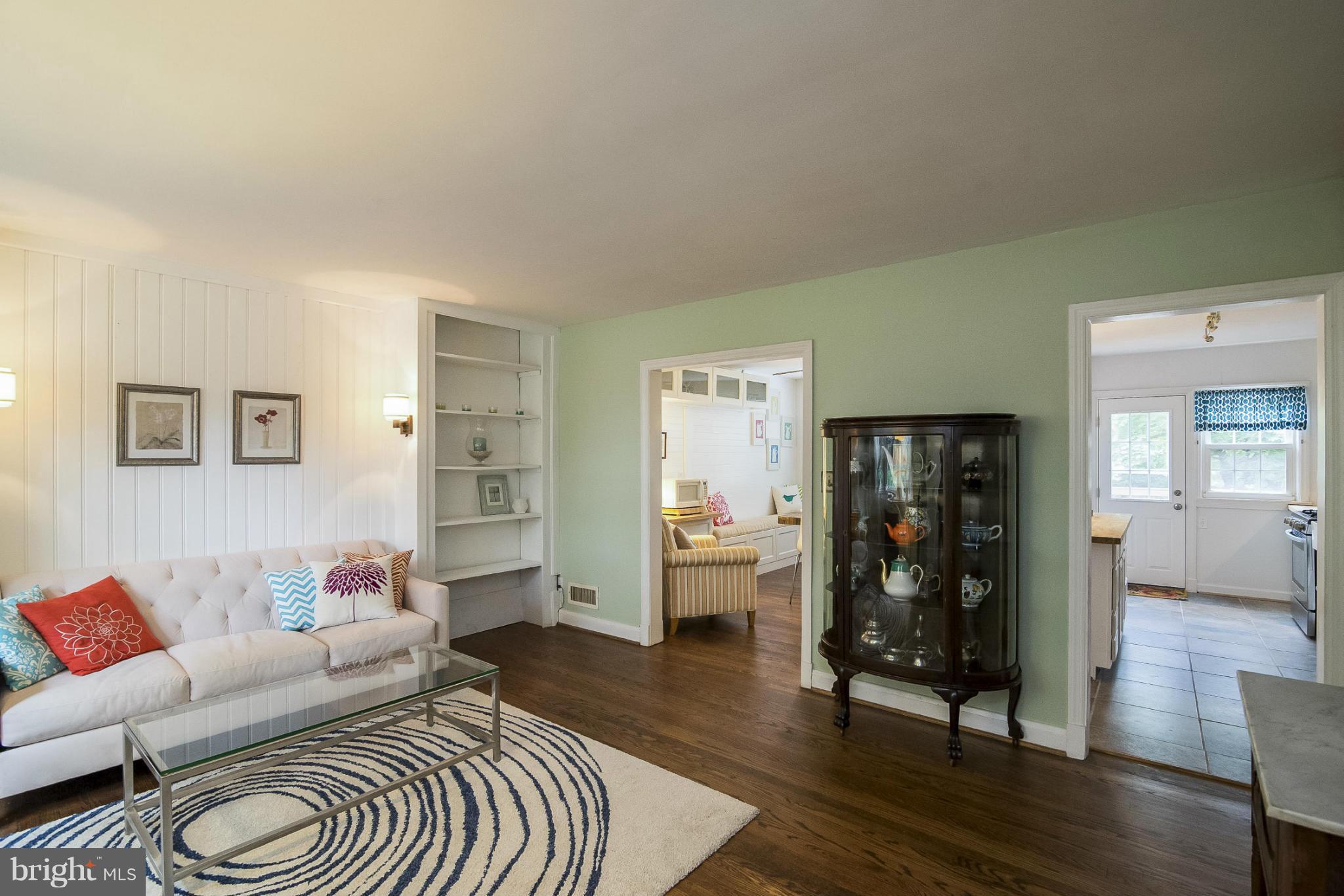 245 Blenheim Road Baltimore, MD 21212 - Photo 2 of 27 a living room with furniture and a wooden floor