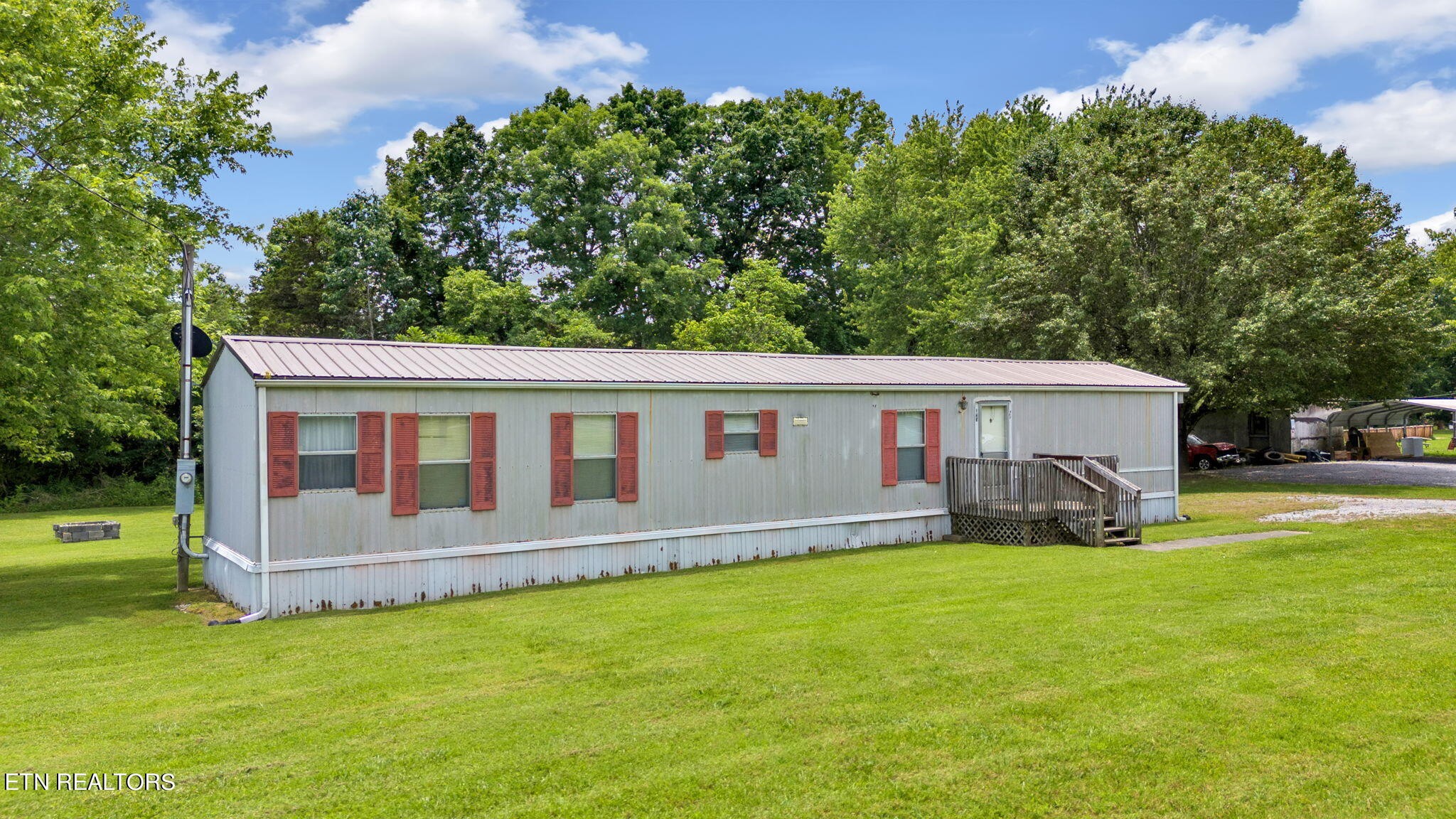 480 Oasis Road Bulls Gap, TN 37711 - Photo 1 of 16 a view of a house with a yard