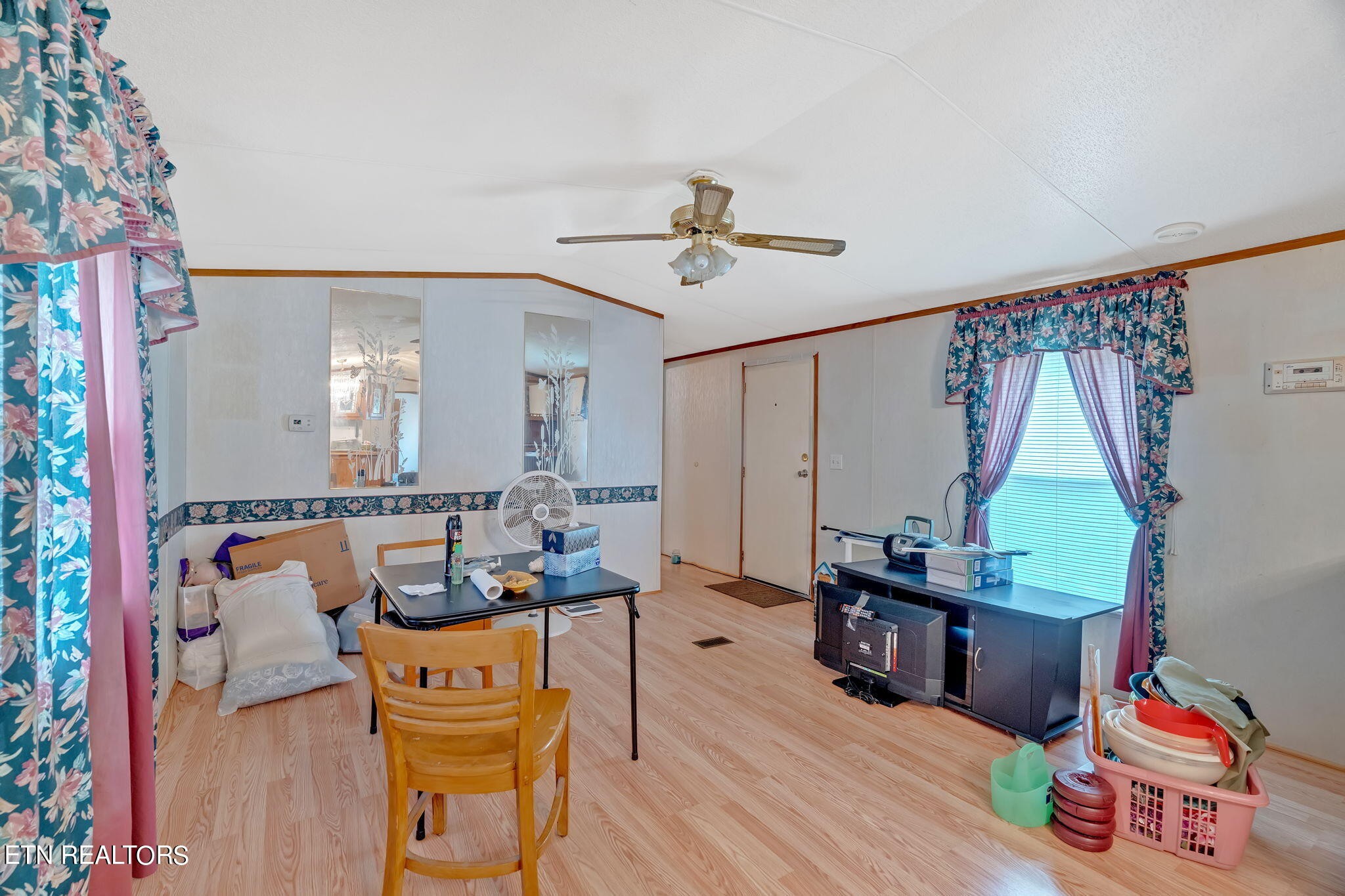 480 Oasis Road Bulls Gap, TN 37711 - Photo 9 of 16 a living room with furniture and a wooden floor